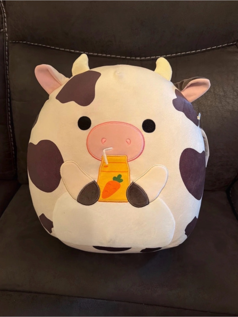 NWT Squishmallows “Colin” Cow Plush Pillow with Carrot Juice Design